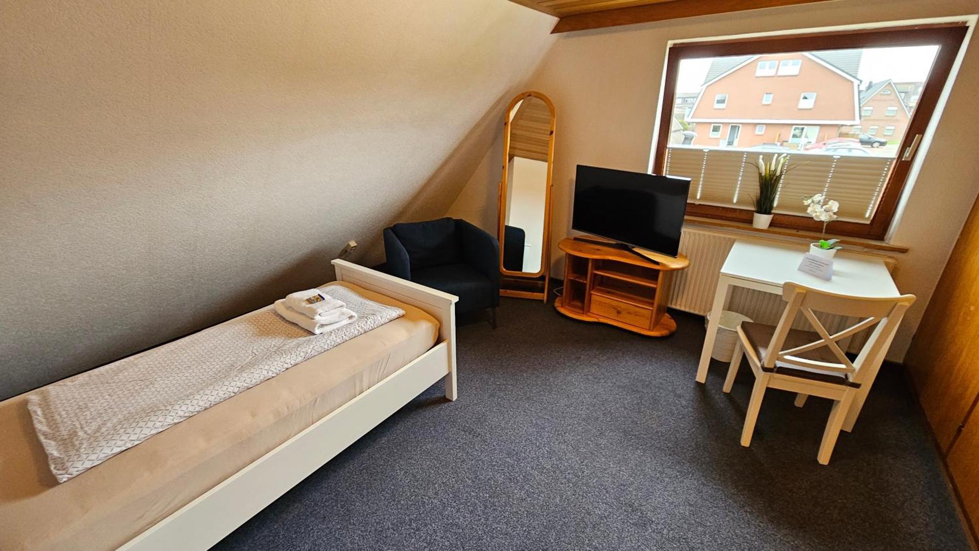 Hotel Dorfkrug Buesum - Guenstige Altbauzimmer Am Oland Rom bilde